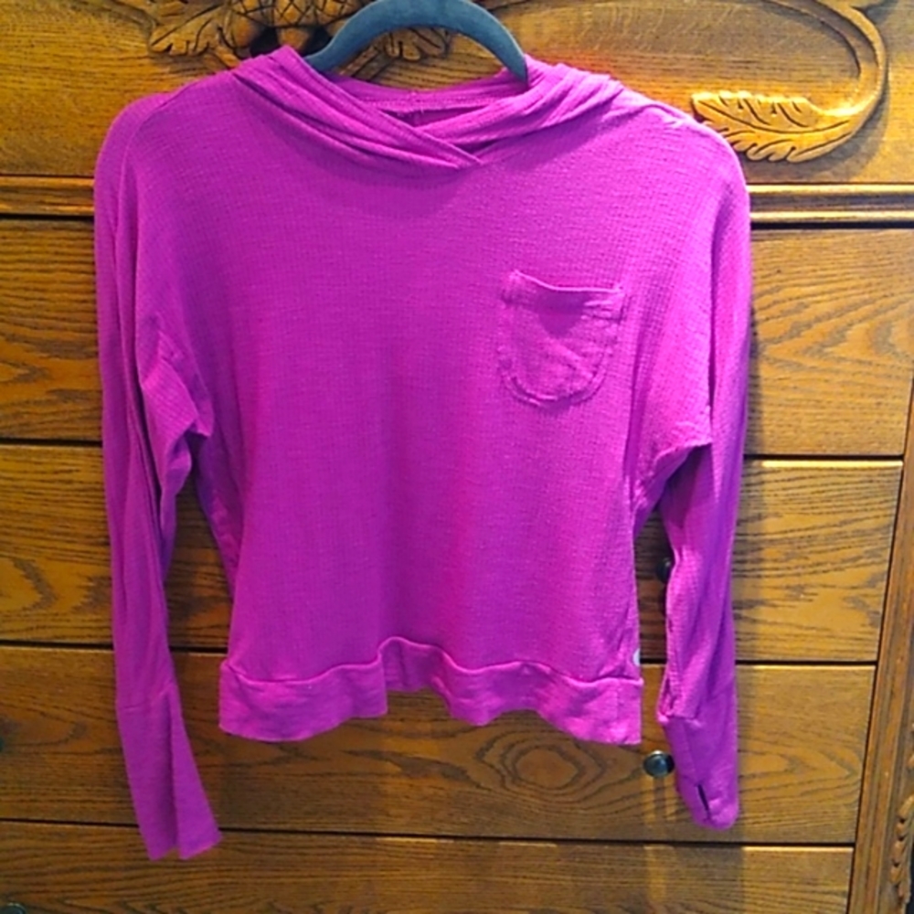Zella, pink activewear pullover hoodie with thumb holes in great used condition.